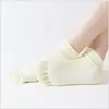 Calcetines de yoga punta abierta profesionales dispensadores antideslizantes calcetines de yoga de cinco dedos para mujer calcetines para los dedos una generación de pelo