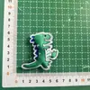 2025 Nuevo Relleno de Tela de Algodón Lindo Dibujo Animado Cohete Dinosaurio Cocodrilo Oso Personaje de la Suerte Zapatos y Calcetines Ropa Accesorios Accesorios