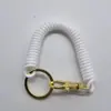 Llaveros al por mayor, Cordones telefónicos de cable de teléfono de colores, Cuerdas de seguridad retráctiles de resorte dorado anti-pérdida, Cuerdas de resorte de plástico