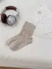 Calcetines retro de mujer hasta la pantorrilla con patrón de rombos calados de Zhuji, calcetines de algodón de malla transpirable para principios de primavera, calcetines de mujer lisos apilables simples