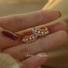 Aretes de Perla Pequeña de Sentido Avanzado Aretes Champagne Lujo Ligero Elegante Diseño de Nicho Aretes Vintage