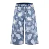 Calça jeans cropped larga de alta resistência com tie-dye graffiti para homens, estilo punk moderno com design de respingos desbotados, shorts de corte reto