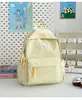 Mochila nueva de alta apariencia estilo japonés ins fresca y dulce de colores caramelo para estudiantes de secundaria y preparatoria, bolsa de doble hombro ligera y de gran capacidad