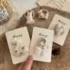 Corea del Sur Nuevo Pasador de Pelo Bordado de Conejo de Dibujos Animados Cachorro Encaje Anillo para el Cabello Infantil con Perlas Todo Fósforo Accesorios para el Cabello Infantiles Pasador