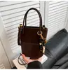 Bolsa Feminina Outono Fosca Retrô Saco Balde Color Block Bolsa de Ombro Alta Aparência Casual para o Dia a Dia Bolsa de Ombro Único Bolsa Transversal
