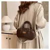 Bolsa de Bowling Portátil Simples Retrô Feminina 2026 Estilo Coreano para o Dia a Dia Crossbody Bolsa Almofada Moda Casual Bolsa de Ombro