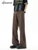 Pantalones negros acampanados de corte limpio para hombre, estilo Hong Kong, con forro polar, adelgazantes, para otoño, con caída, elegantes y versátiles.