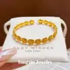 Mismo estilo que las joyerías Arena dorada Método antiguo Pulsera de flor de rosa Nuevo estilo chino Color oro de imitación Tallado tridimensional Pulsera abrible Venta al por mayor