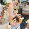 Luckin Coffee Mini Naranja C Americano Botella Arena Líquida Llavero Tendencia de Verano Colgante para Bolso de Pareja Regalo