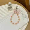 Nuevo Colgante de Mariposa Colorida Flor con Cuentas Llavero Decoración para Funda de Auriculares de Niña Adorno Colgante Colorido Venta al por Mayor