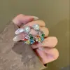 Exquisitos pendientes florales de perlas con un tacto lujoso y sofisticado, estilo vintage francés, diseño de nicho, pendientes versátiles