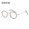Linde mismo estilo 7g montura de gafas sin tornillos moda masculina ovalada Xiaohongshu montura de gafas de titanio puro para mujer sensación de alta gama 5805
