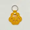 Novo pingente memorial criativo para guardar pelos de pet, porta-cartão de acesso à porta anti-perda, pingente de chaveiro de pata de cachorro
