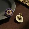 Pendientes de botón de esmalte morado con flor de diamante y perla Estilo de corte Pendientes redondos Lujo ligero Sensación de alta gama Pendiente de temperamento nicho Accesorios