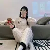 Fábrica fuente pijama nuevo de manga larga de forro polar coral para mujer otoño e invierno franela gruesa invierno conjunto para estar en casa