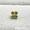 Pendientes de aleación de titanio ASTMF-13 flor de cuatro pétalos de circonita ultra brillante dorados Perforación de labio de circonita con rosca interna de titanio G23