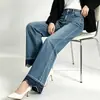 Venta directa de fábrica de nuevos jeans acampanados elásticos de corte holgado con bordado de encaje único y adornos de pedrería, diseñados para crear un efecto adelgazante para mujer