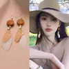 Aretes de Estilo Exótico de Venta Caliente Retro Literario Clásico Dignificado Ganchos para la Oreja Versátil Hueco Moda Borla Colgantes