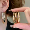 Pendientes de gota de agua con brillo metálico europeos y americanos, Pendientes de botón de moda, sencillos y versátiles, Pendientes de diseño de nicho