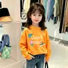 Camiseta de algodón puro de manga larga para niñas, nuevo estilo 2026, top súper lindo para niñas y niños pequeños, elegante atuendo de otoño para niños