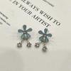Pendientes de estilo pastoral fresco con margaritas mori y borlas pequeñas, diseño de nicho femenino, exquisitos pendientes.