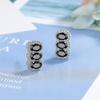 Outlet de Fábrica Aretes Nuevos Incrustados con Circonita Azul Londres Punto de Diamante Completo Cruz de Cristal Afilada Pendientes Europeos y Americanos Transfronterizos