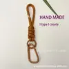 Cordón para Teléfono Móvil Tejido a Mano para Mujer Exquisito Llavero de Bolsillo de Gama Alta Cordón Anti-Pérdida Estilo Muñeca