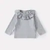 Conjunto de tres piezas para bebé niña de otoño: camisa base dulce con cuello de volantes, suéter tipo chaleco, camisa de muñeca, pantalones florales de pierna ancha