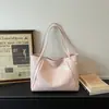 Bolso tote de gran capacidad a la moda para mujer, nuevo modelo 2026, bolso de hombro casual y simple, alto valor estético, adecuado para el trabajo y el transporte diario