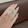 Explosiones Europeas y Americanas Cadena Súper Brillante de Diamantes Completos Pendientes con Borla Moda Lujo Ligero Moda de Gama Alta Joyería de Oreja Exquisita Versátil
