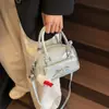 Bolsa Pequena Super Popular para Mulheres Primavera 2026 Laço Gatinho Kt Bolsa Torrada Prata Versátil Moda Ombro Transversal
