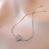 Juego de tres piezas de aretes de traje pulsera anillo japonés y coreano amor transfronterizo joyería collar nuevo collar mujeres giratorio