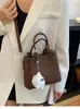 Bolso Cruzado Versátil Estilo Ins para Mujer 2026 Nuevo de Moda Tendencia Versión Coreana Bolso de Mano Cuadrado Pequeño con Acabado de Alta Gama