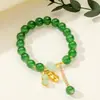 [Venta al por mayor directa de fábrica] Nuevo estilo chino Imitación Jade Dongling Puesto de Exhibición de Feria de Templo del Mercado Nocturno Pulsera de Vidrio Joyería Más Vendido