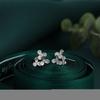Aretes de Tuerca para Mujer Elegantes y Vigorosos con Diseño Simple y Nicho de Venta Caliente Transfronteriza, Chapados en Cobre Prímula con Oro Real