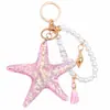 Llavero Pulsera Personalizada de Perlas y Estrella de Mar Estilo Verano Océano Colgante de Estrella de Mar de Resina AliExpress Regalos Pequeños Transfronterizos