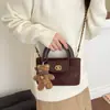 Bolso de mano de alta gama para comercio exterior, nuevo bolso cubo retro de nicho estilo coreano, elegante bolso de hombro, moderno bolso cruzado