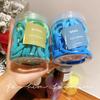 Lazo para el cabello enlatado cuerda banda elástica cuerda para la cabeza femenina accesorios para el cabello para cabeza de bola estilo japonés simple cubierta de cuero temperamento celebridad de internet banda para el cabello al por mayor