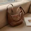 Bolsa Sela Vintage para Mulheres, Nova Bolsa Versátil em Forma de Meia-Lua Outono/Inverno 2026, Adequada para o Dia a Dia, Bolsa de Mão, Bolsa de Ombro, Bolsa Pequena Transversal