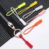 En stock Cabezal de Cremallera Negro Cordón Cabezal de Tirón Cuerda para Colgar Cabezal de Tirón Desmontable Cuerda de Tirón Cuerda de Tirón de Color Silicona