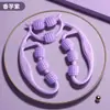 Masajeador de piernas para adelgazar muslos y pantorrillas, un dispositivo que utiliza pinzas circulares y rodillos para masajear y estimular los meridianos, promoviendo la pérdida de peso