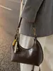 Bolsa Transversal de Ombro Feminina Casual Vintage de Nicho Nova Outono e Inverno 2026 Bolsa de Mão Versátil Bolsa de Axila
