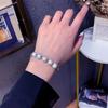 Pulsera Ins Europea y Americana de Alta Gama con Parche de Cruz de Perlas Reflectantes, Acolchada, para Hombre y Mujer, Tendencia de Joyería de Moda Nicho Hip-Hop
