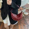 Bolso de hombro minimalista de gran capacidad transfronterizo, bolso de diseño nicho tipo bollo con tachuelas, bolso cruzado retro moderno versátil