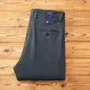 Colección otoño e invierno 2026: Pantalones de vestir de sarga, forrados de forro polar, engrosados, cálidos, de alta gama, versátiles, corte holgado, pierna recta, pantalones casuales para hombre