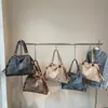 Bolso tote de gran capacidad para mujer, nuevo bolso de hombro versátil de moda vintage, bolso tote de alta gama para el día a día