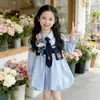 Vestido para Niña Primavera y Otoño 2026 Estilo Nuevo Infantil Manga Larga Conejo Oficial de Policía Estilo Academia Brote de Flor Bebé Vestido de Princesa