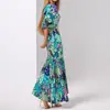 Nueva colección de verano 2026 de ropa europea y americana para mujer para exportación y ventas transfronterizas: vestidos estampados de moda y elegantes con mangas abullonadas