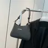 Bolso de Hombro Casual y de Moda 2026 Primavera Nuevo para Viajes Diarios Color Sólido Bolso de Axila Bolso Mensajero Bolso de Mano Elegante con Temperamento