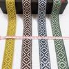 Fábrica en stock 2.5CM estilo nacional cinta de diamante jacquard por computadora cinta de poliéster bicolor de doble cara accesorios